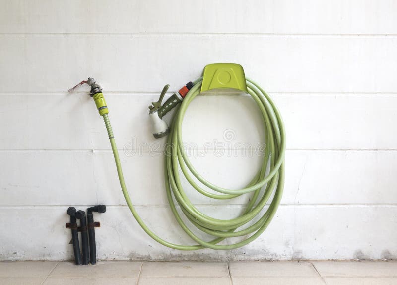 Water Faucet and Green Garden Hose Stock Image Image of nature