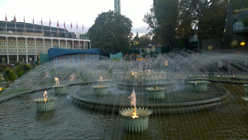 A view of an intricate water feature in Tivoli gardens in Copenhagen