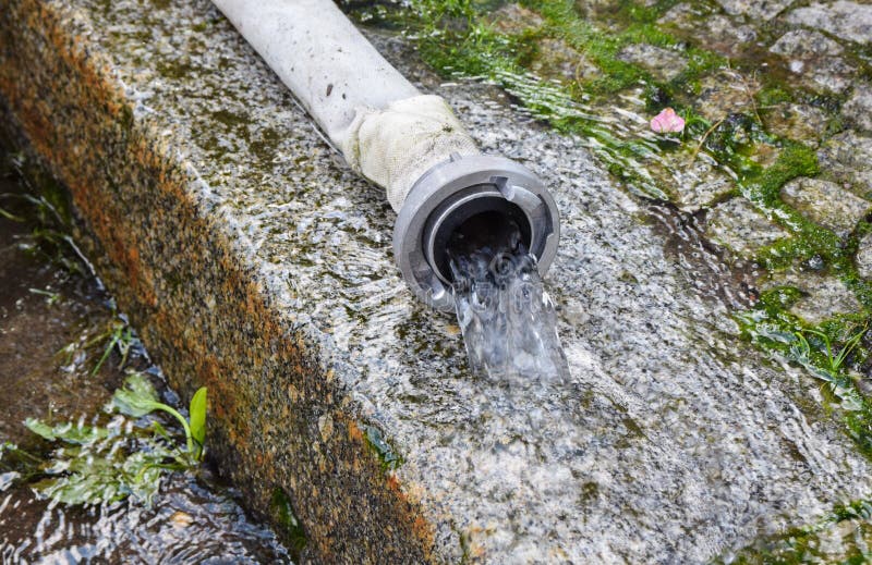 trying to take a sip of water from a fire hose trying to take a sip of water from a fire hose
