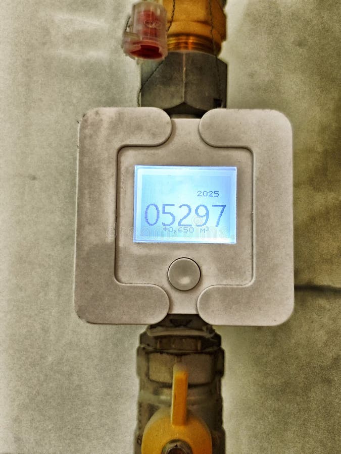 Display shows water usage in cubic meters with a clear digital readout in a home environment, indicating current flow. Reading efficiency stock images, royalty-free photos and pictures