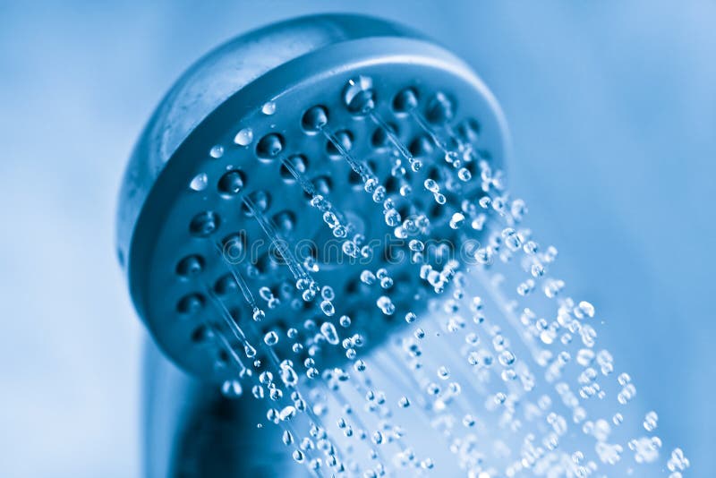Closeup of a Shower Head with Sprinkling Water. Stock Photo Image of