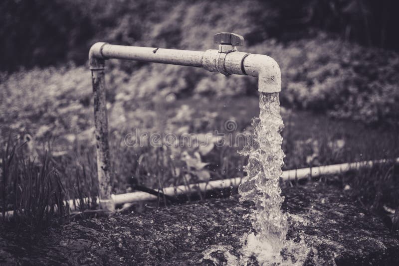 Water Flowing through a Pipe Stock Photo Image of background, pipes