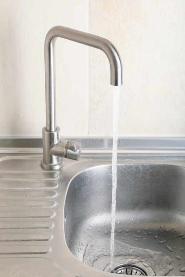 Water Flowing from the Tap in the Kitchen Sink Stock Image Image of