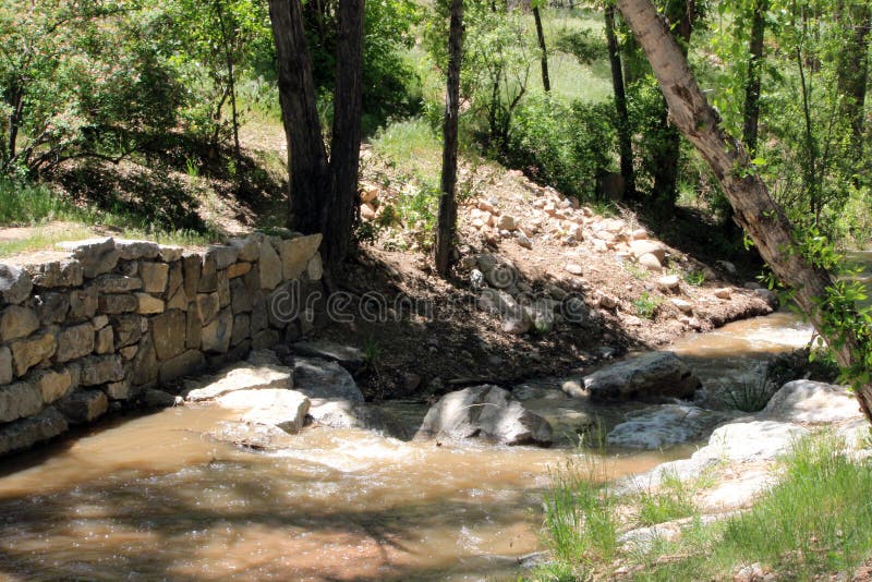 Water Flows Downhill stock photo. Image of fence, water 71540350