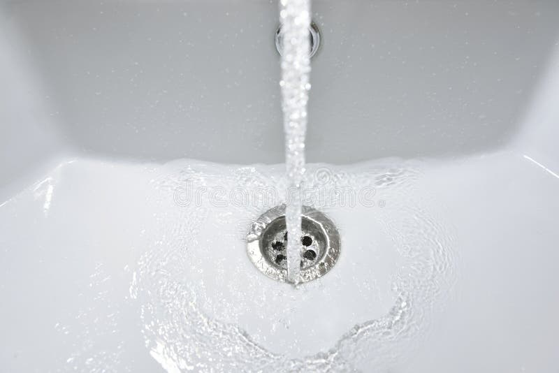 Water Flows into a New White Sink in the Bathroom Stock Image Image of drop, drip 165460793