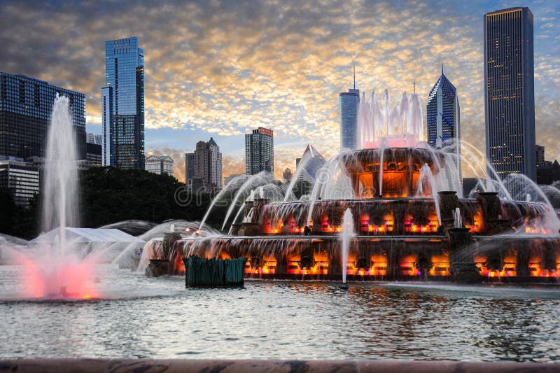 Water Fountain Water Display in Front of the Chicago Skyline Right at the Sunset Hour. Stock
