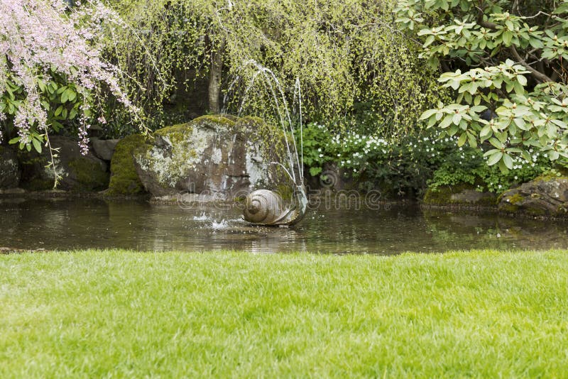 Water Fountain in Garden Pond