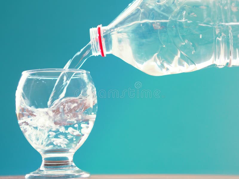 Water Glass and Water Bottle with Water Filling Stock Photo Image of