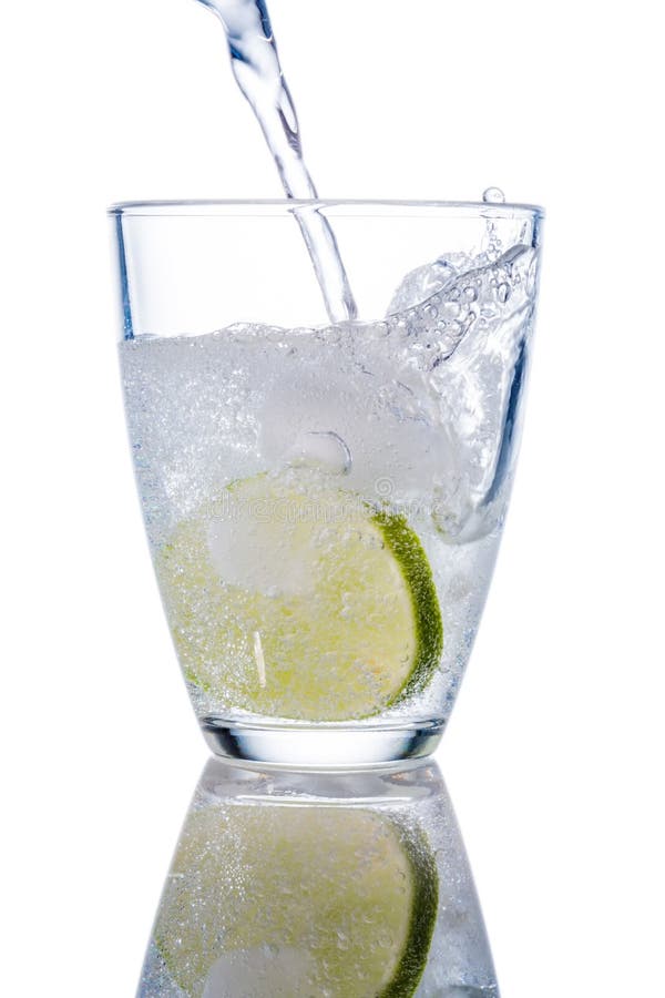 Water glass and lime stock image. Image of quellwasser 37731851