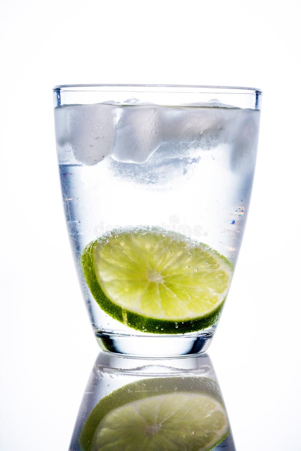 Water glass and lime stock image. Image of dehydration 52483629