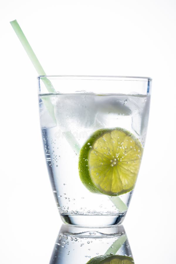 Water glass and lime royalty free stock photography