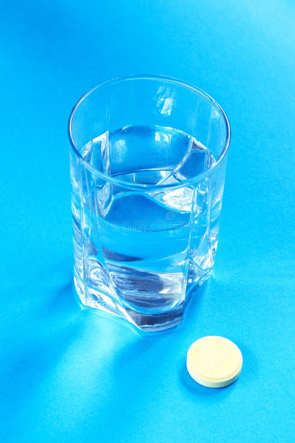 Water glass and pill