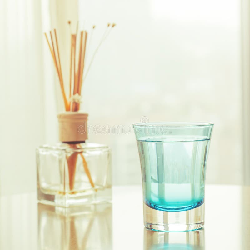 Water glass on wood table stock image. Image of mirror 49627483