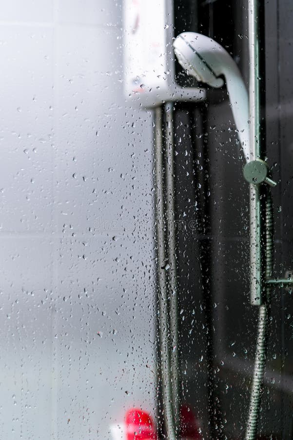 Water Heater and Shower Spray in Bathroom. Stock Photo Image of rain
