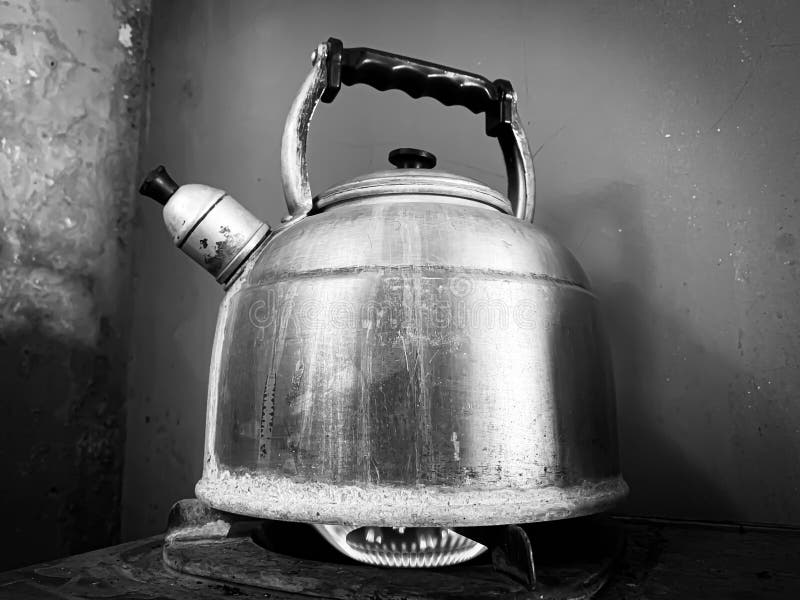 Waterheating Kettle on a Wornlooking Stove Stock Photo Image of