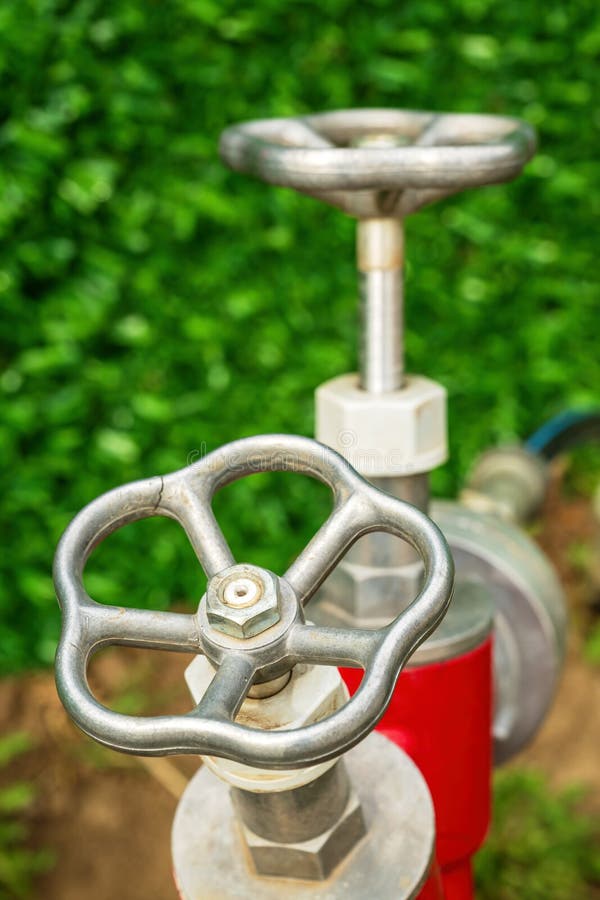 Water hydrant gate valve on street stock photos