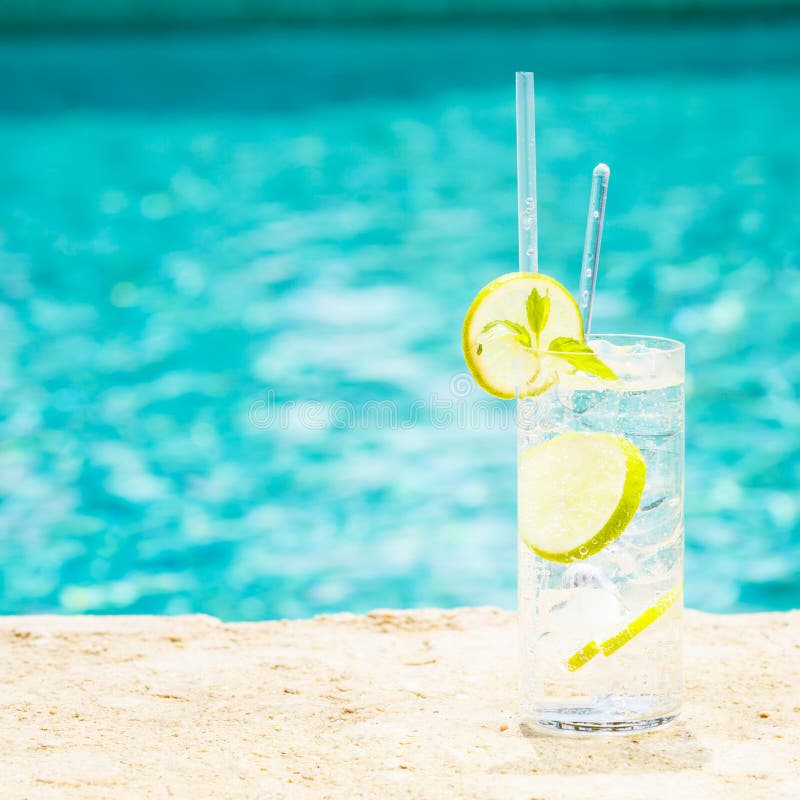 Water with ice at the edge of a resort pool. Concept of luxury v. Acation. Outdoor pool background. Square royalty free stock photos Water with ice at the edge of a resort pool. Concept of luxury v. Acation. Outdoor pool background. Square royalty free stock photos