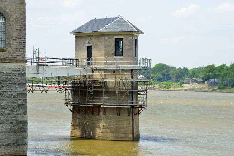Water intake at waterworks building under restoration at the edge of river