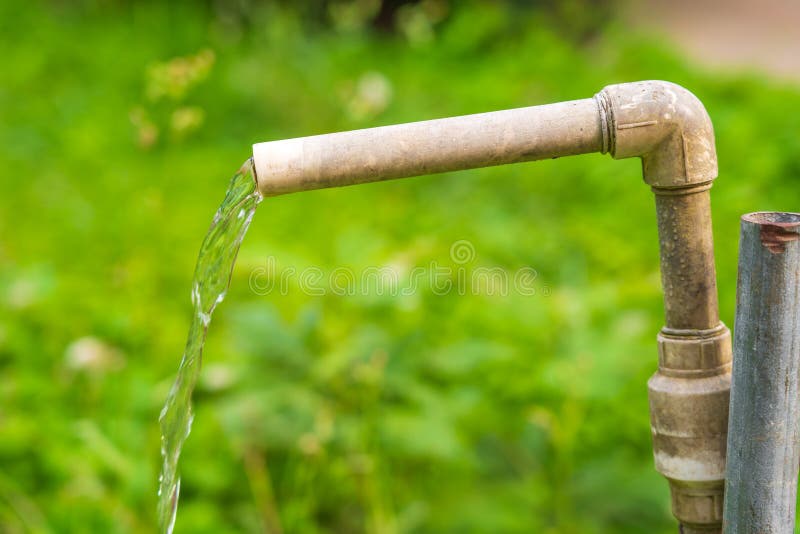Water jet from a pipe stock image. Image of garden, flowing 258042781