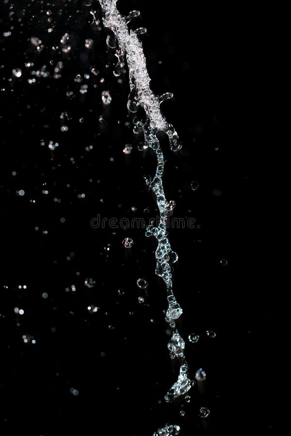 Water Jet with Spray on a Black Background Stock Photo - Image of contrast,  bright: 205748012