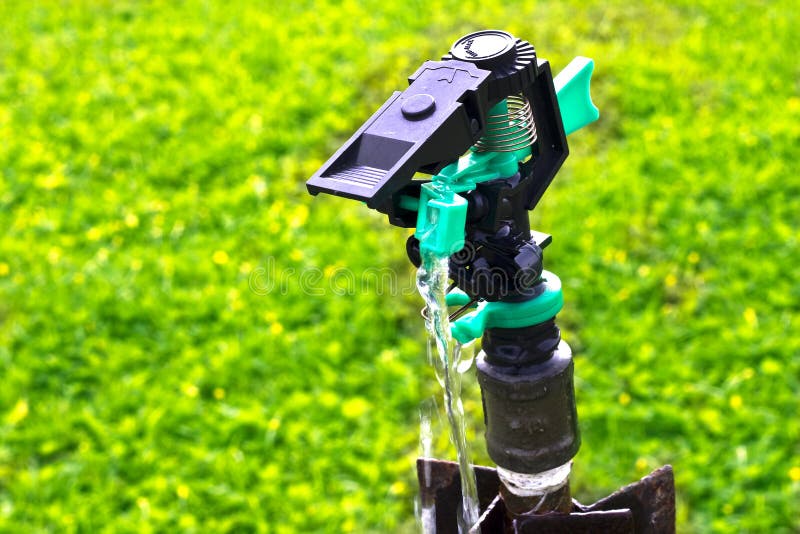 Water Jets Sprinkling a Soccer Stadium Field. Stock Image Image of