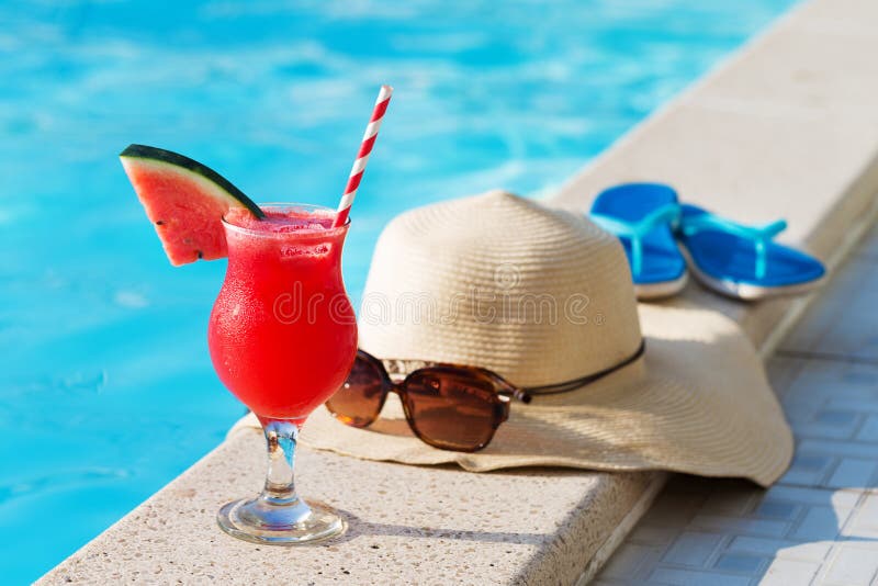 Water-melon smoothie drink with sunglasses, hat