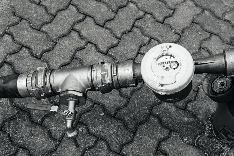 Water meter in city stock photos Water meter in city stock photos