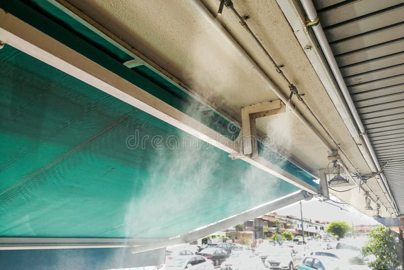 Water Mist Cooling System on Ceiling Lowers Tropical Ambient