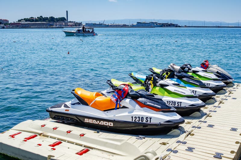 Water motorcycle drivers stock photo. Image of extreme - 996464