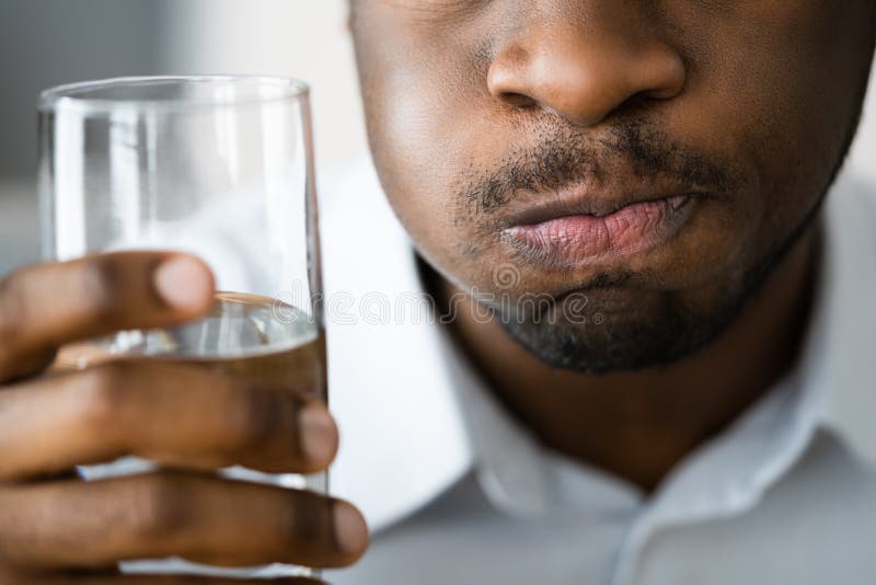 Water Mouth Gargle And Rinse. African American Man