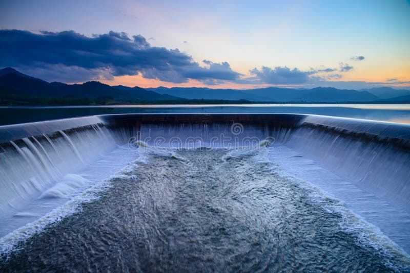 Water overflow into a spillway stock photography