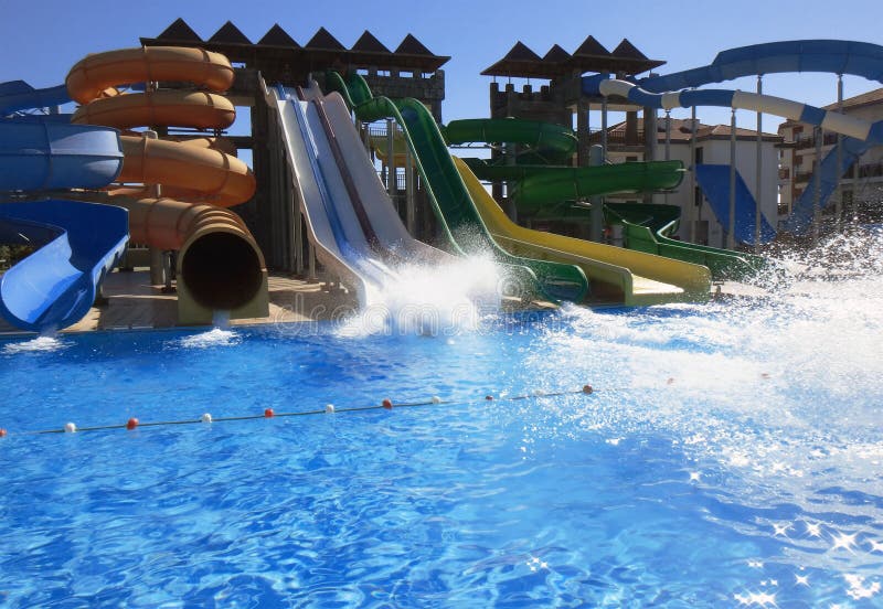Water Park with Swimming Pool. Many Different Slides Stock Photo