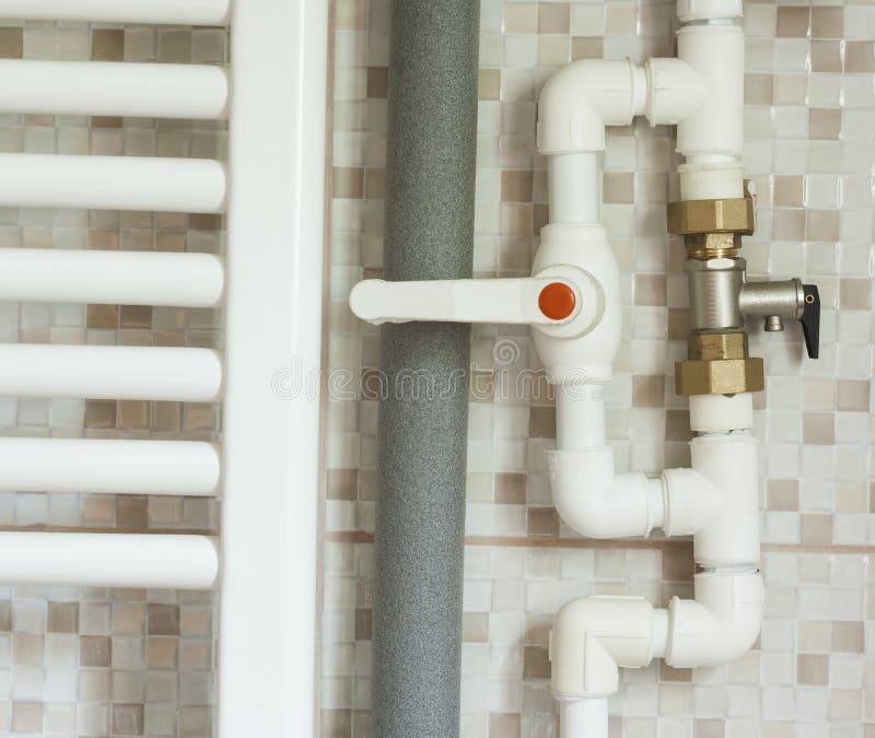 Water pipes in bathroom stock photo. Image of industry 73633006