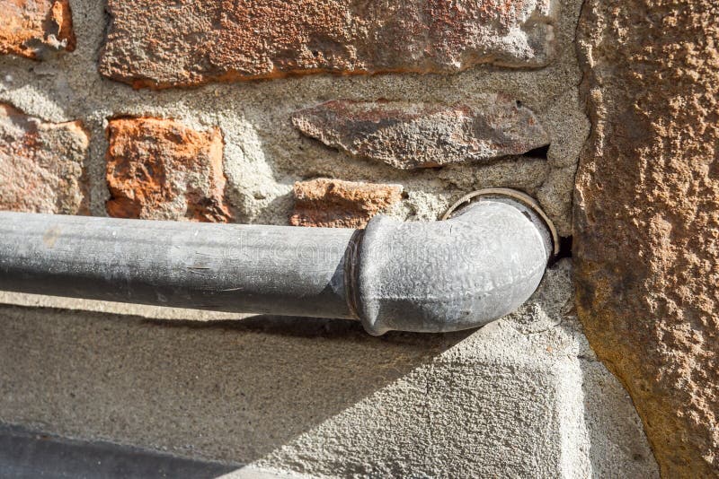 The water pipes on the wall stock photo
