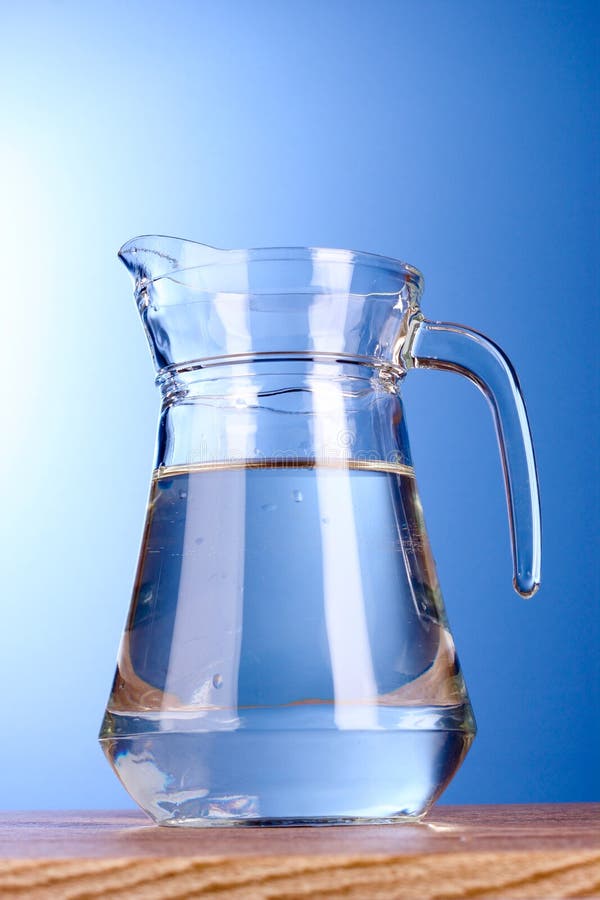 Hand Pouring Water from Glass Pitcher Stock Photo - Image of pouring,  refreshment: 61845744