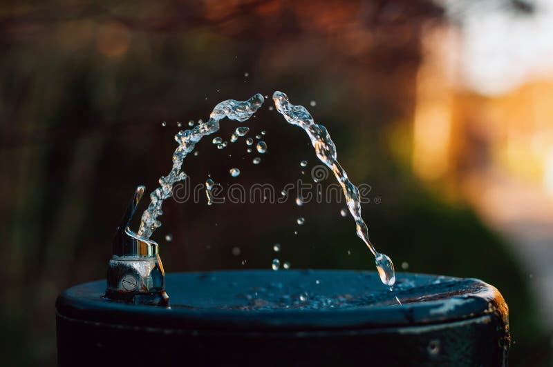 Water Pouring from Drinking Fountain