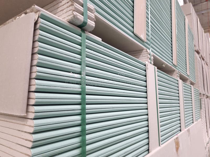 Water resistant plasterboard sheets stacked in a hardware store. royalty free stock image