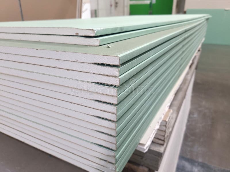 Water resistant plasterboard sheets stacked in a hardware store. royalty free stock photography