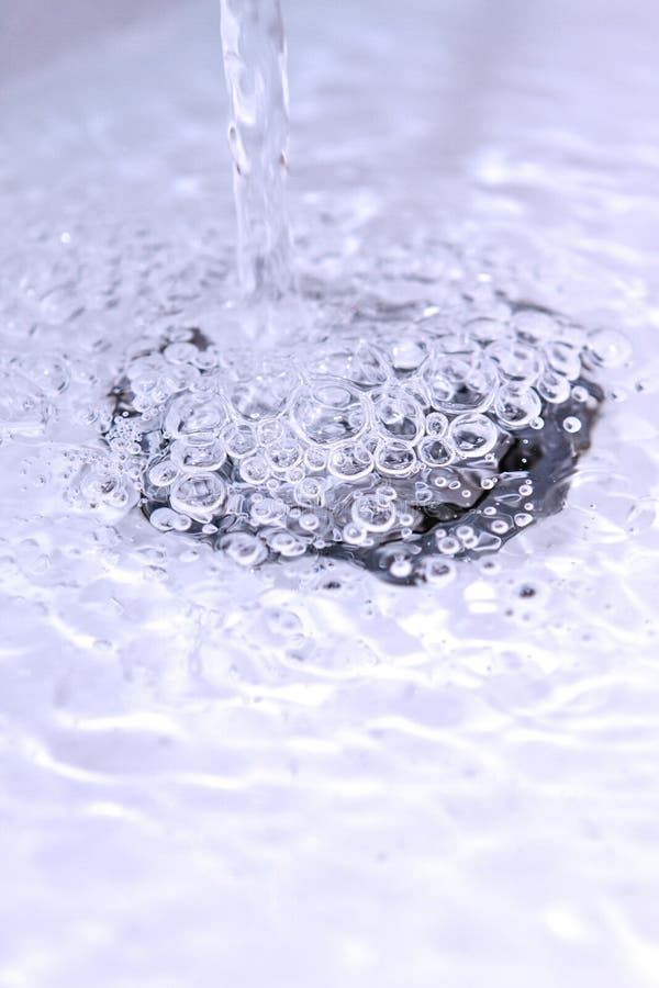 Water Running Down a Bathroom Sink Plug Hole Stock Photo Image of
