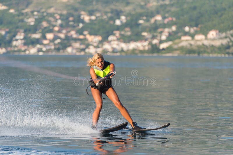 Water skiing on a sea stock photo. Image of warm, blue 49685330