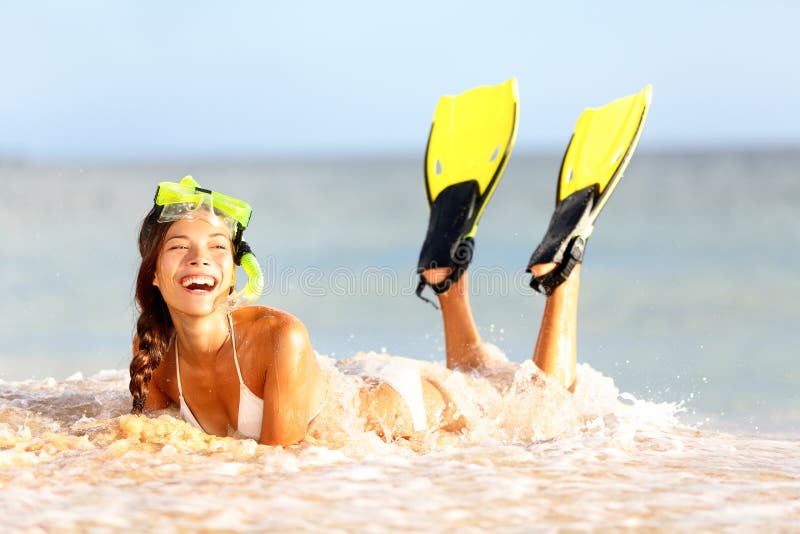 Water snorkeling fun beach woman laughing royalty free stock photography