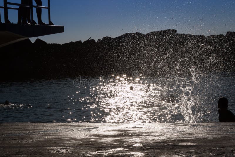 Water Splash Child Jumping from Board into Water Stock Image Image