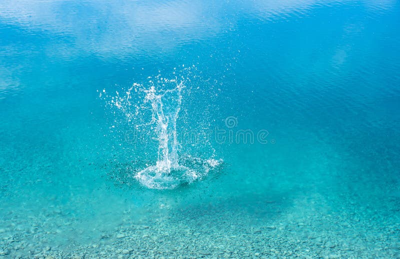 Water splash in a lake stock photo. Image of stone, playing - 170186208