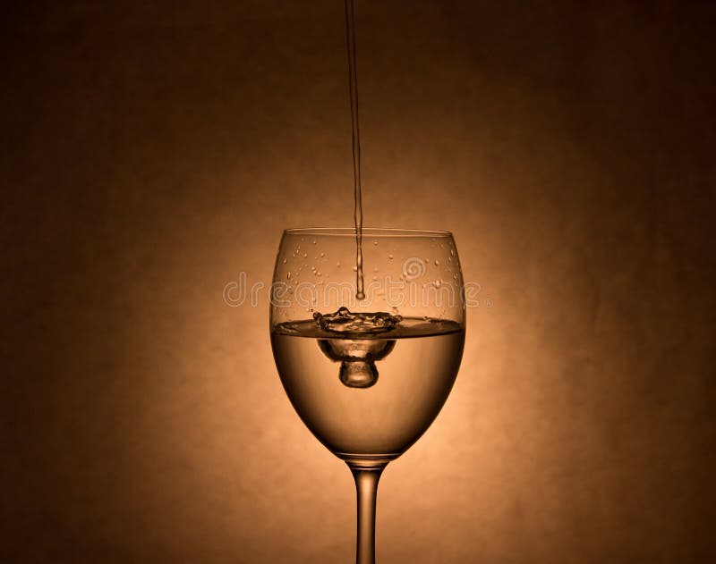 Splash in Vine Glass on Turquoise Background Stock Image Image of