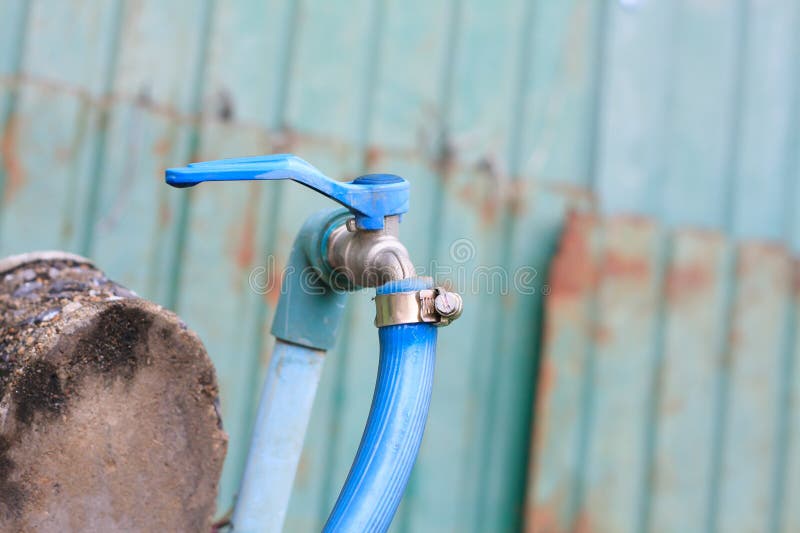 Water tap with rubber line stock image. Image of plastic 111225881