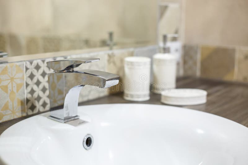 Water Tap Sink with Faucet in Expensive Loft Bathroom Stock Image