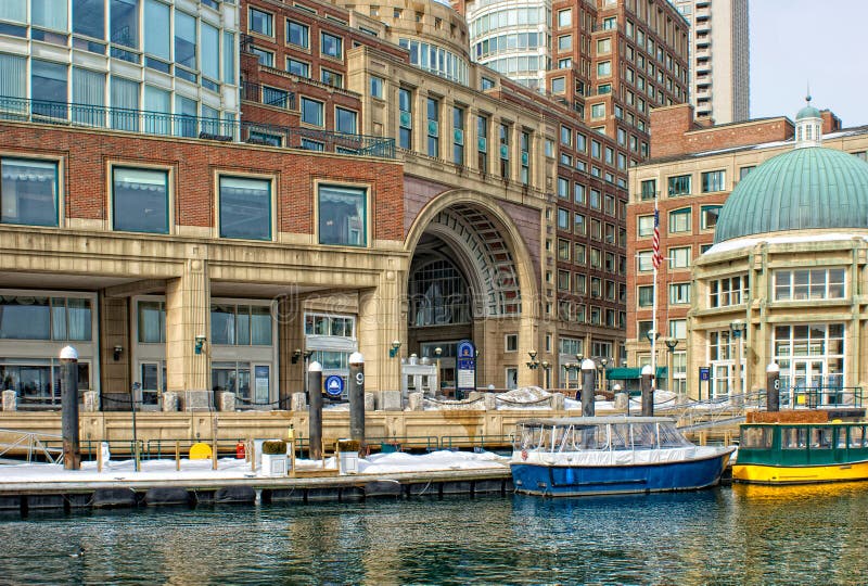 Water taxis inside historic rowes wharf in boston