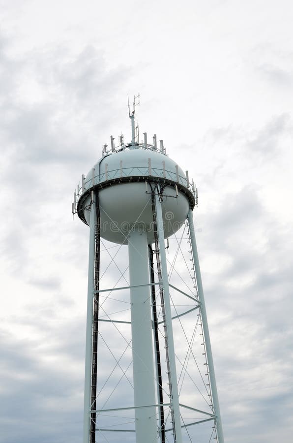 Water Tower Against Cloudy Sky