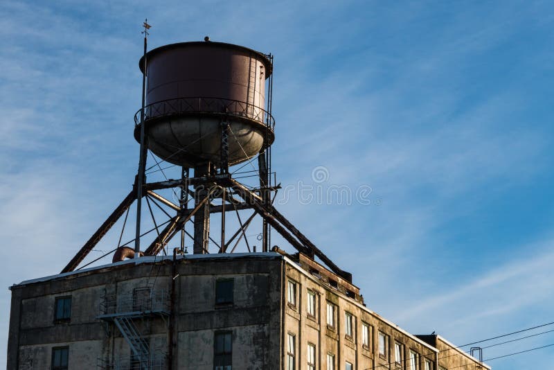 Water tower on roof of old building
