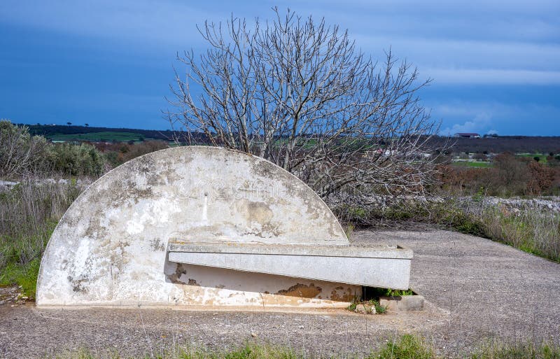 Drainage Trough Across the Forest Path for Logging. Two Poles Connected